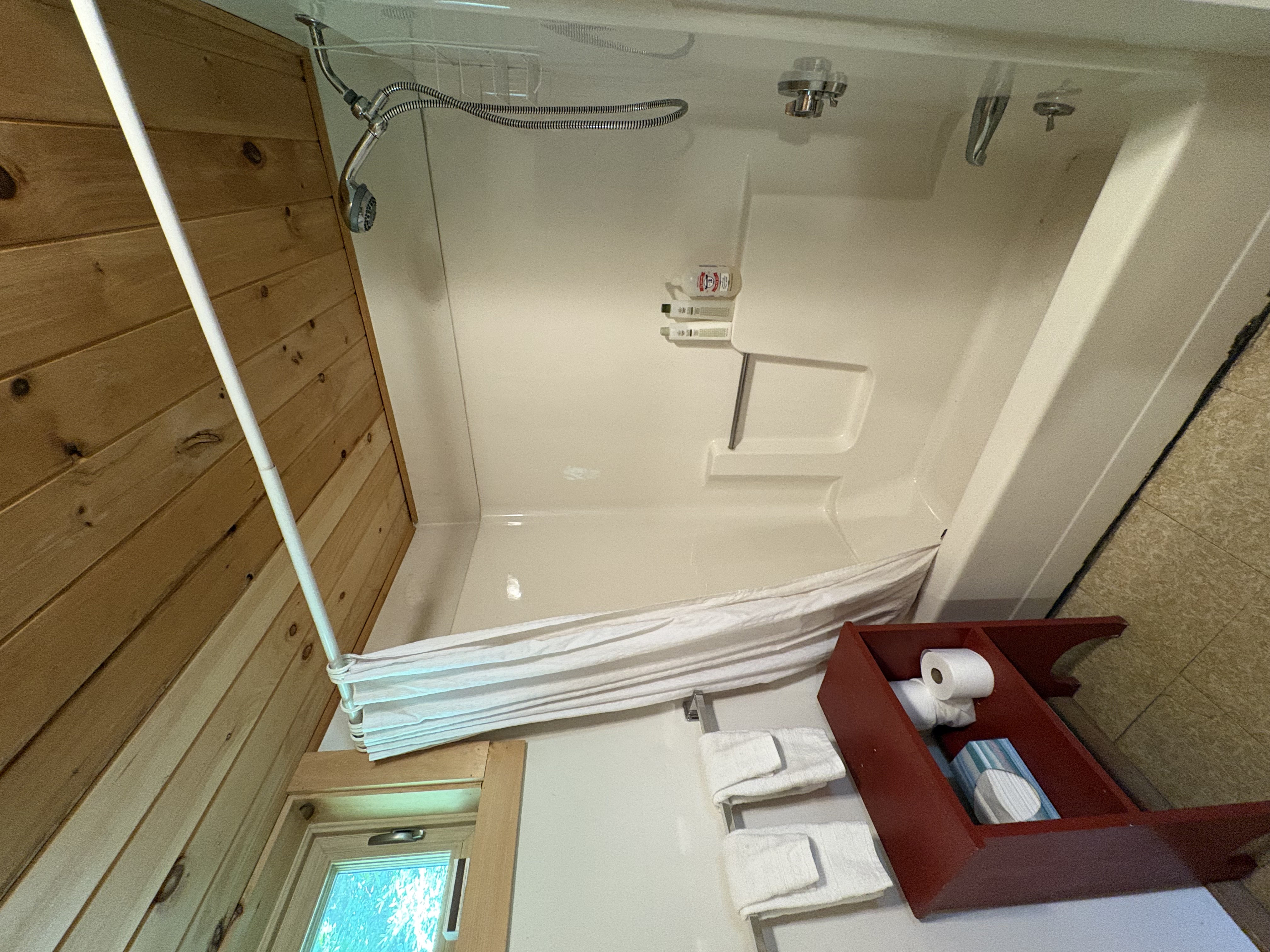 Tub and shower in the bathroom